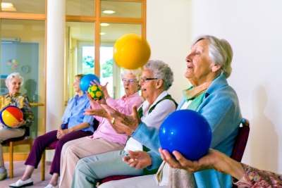 Residents enjoying group exercise activities