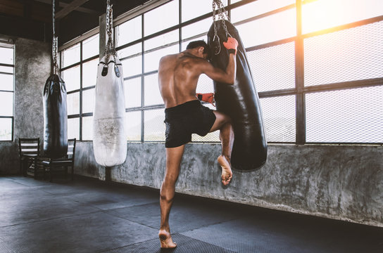 Muay Thai heavy bag kick training